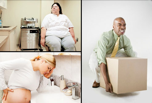 iStock_veer_rf_obese_woman_pregnant_woman_and_man_lifting